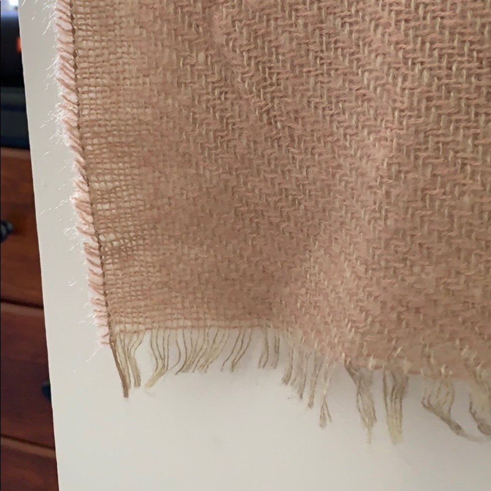 Pink blanket-like scarf